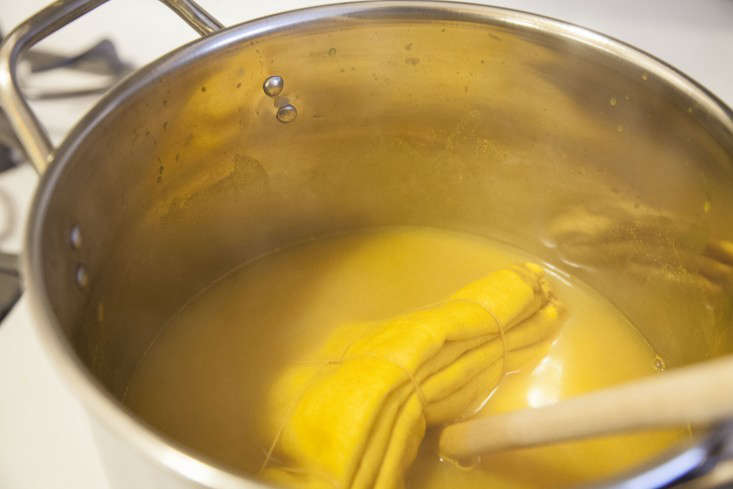  Step 6: Drain the vinegar mixture and pour the turmeric dye over the fabric; heat over medium-low flame. The longer you leave the fabric in the turmeric dye, the darker the color will be. I dyed my fabric for an hour, but you can dye it for as little as \15 minutes to achieve a light, washed look.
