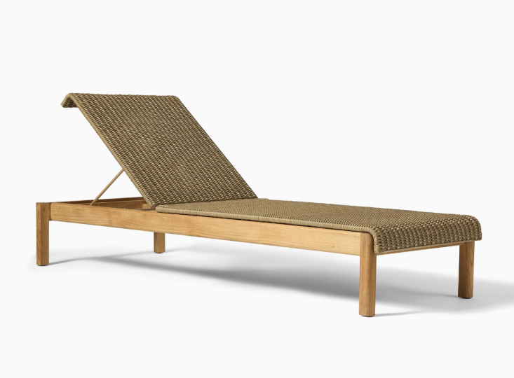 The Cassis Outdoor Teak Stacking Lounge Chair pairs a solid teak frame with wicker seat and backrest; from \$\1,\299 at West Elm.