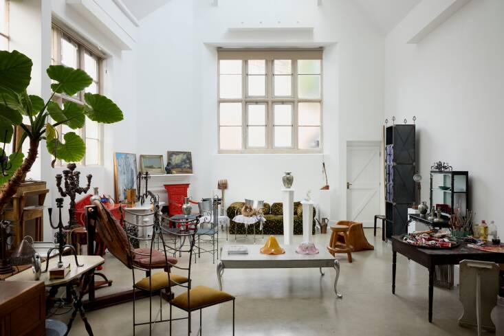 An adjacent room on the first floor is used as an antiques showroom.