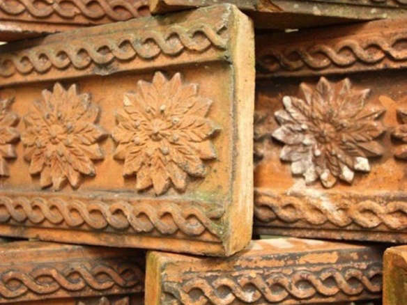 Collection of 12 Antique Terracotta Edging Tiles