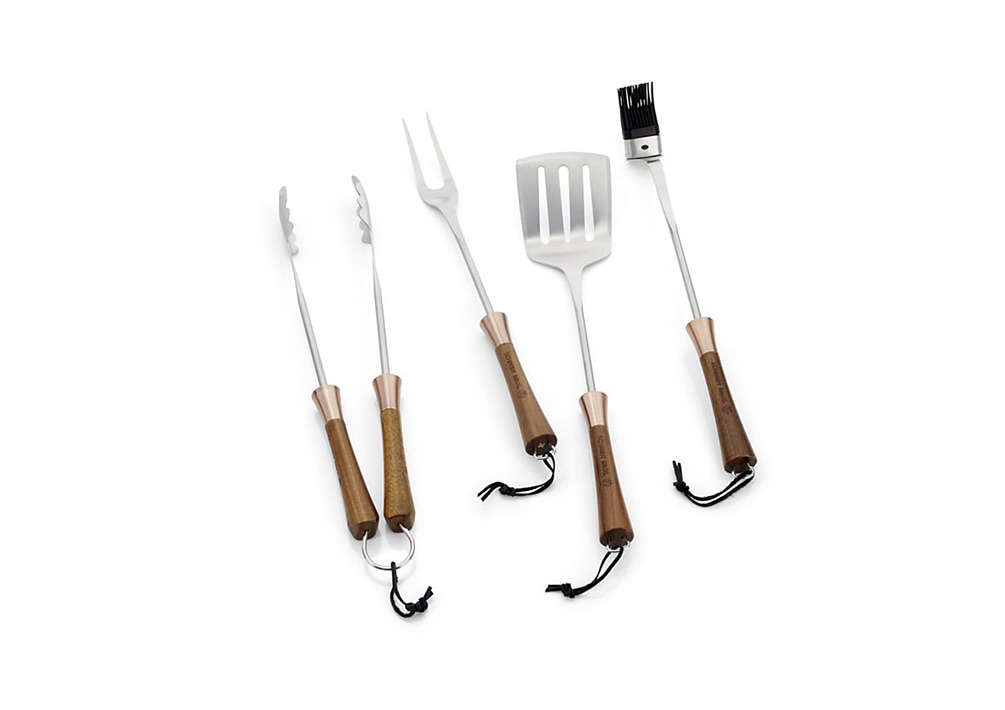 https://www.gardenista.com/wp-content/uploads/2016/11/grilling-barbecue-tool-set-with-copper-details-wood-handles.jpeg