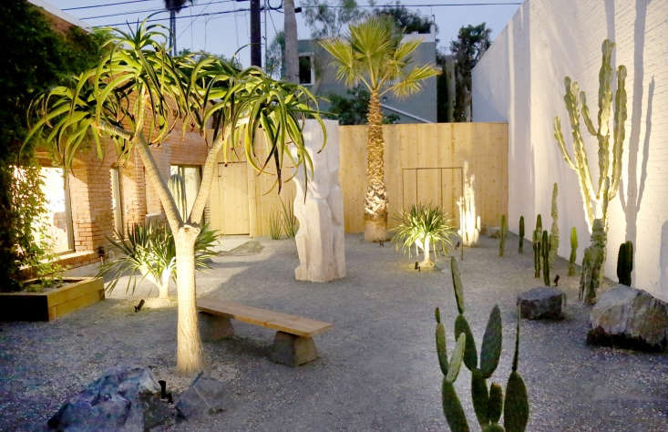 Specimen plants have uplights trained on them to create visual impact at night. (See more ideas at Hardscaping \10\1: Landscape Uplighting.)