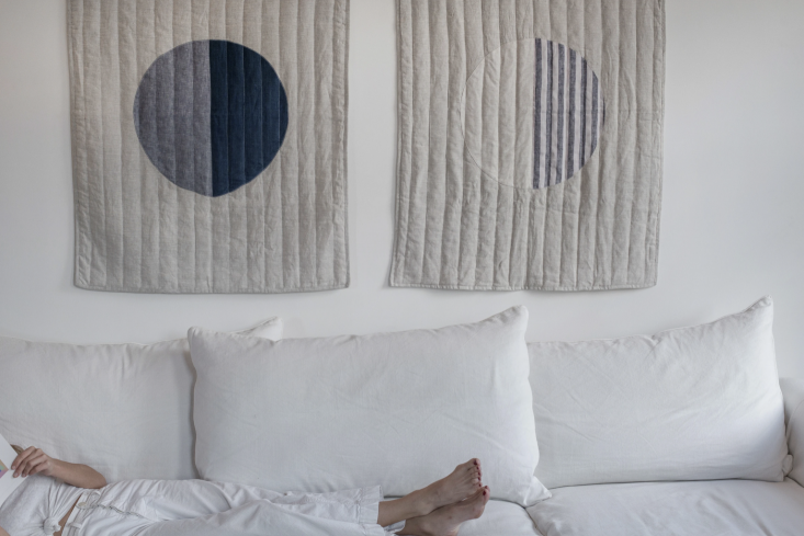 Textiles on walls can instantly warm up a room. (These are by Brooklyn artist Caroline Z. Hurley.) For some stylish ideas, see Trend Alert: Modern Wall Hangings in Wintery Shades of White.