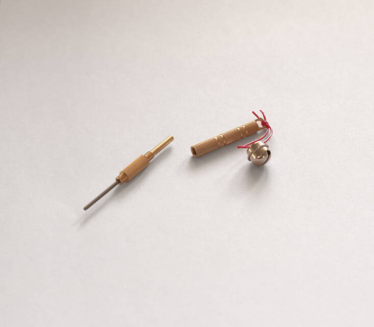Pair the kenzans with a Kenzan Straightener, which can both clean and straighten the prongs. Each straightener comes with a charming bell; \$7.50 from Niwaki.
