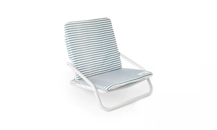 Local Beach offers similarly stylish and compact offerings at a lower price point; their Blue Brush Stripe Beach Chair, for example, is made from waterproof canvas with foam padding for comfort and weighs only four pounds. It&#8\2\17;s \$89.50 from Local Beach.