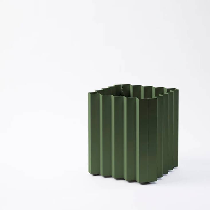 Designed by Justin Champaign and Ben Salthouse for Most Modest, the pleated aluminum Tess Planter is modular so you can configure several together to fit your space. It comes with a drip tray and plug and is available in a range of sizes and colors, including moss (shown), linen, and desert rose; from \$387.