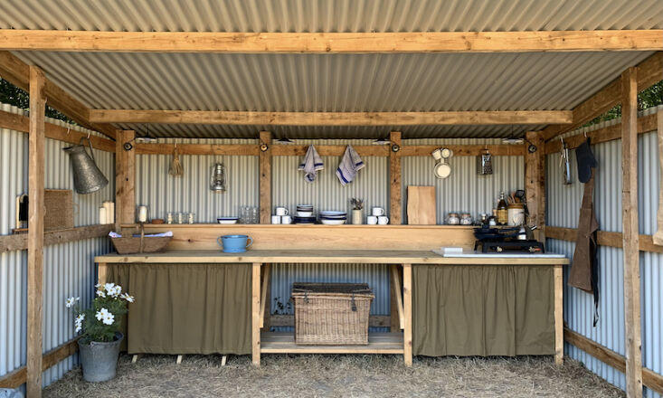 An exceedingly charming outdoor kitchen. Photograph by Gemma Shepherd, from Spot House Farm: What Happens When a Textile Designer Creates a Campsite.