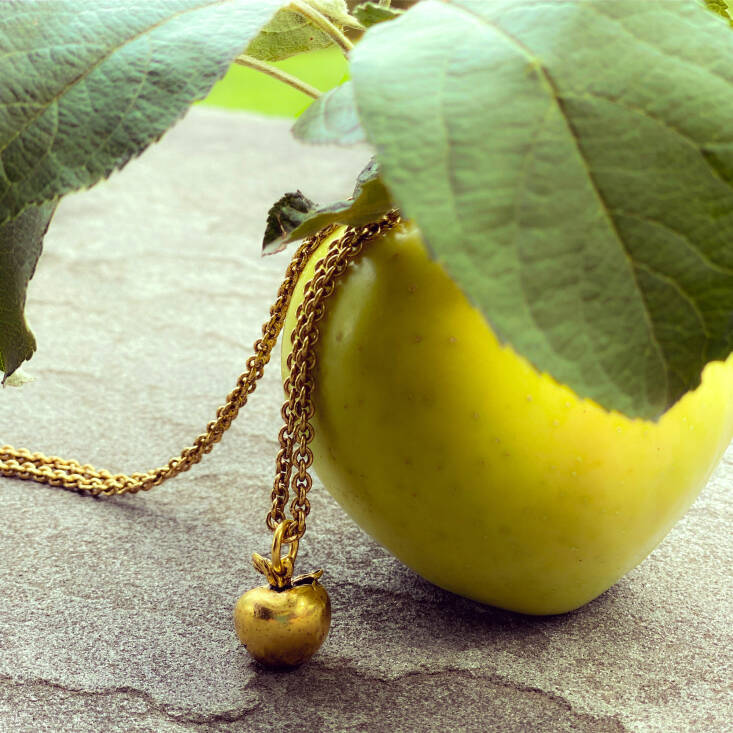 All of Mavecâs designs for her jewelry collection is inspired by the farm, including this necklace which is an homage to her favorite apple, Pink Pearl, which ripens in late August and flaunts pink flesh. âThe necklace is made of brass and dipped in 18k gold. It is ripe for the picking!â says Mavec.Â