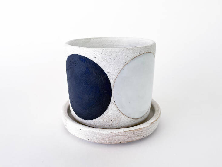 “For this planter collection I focused the images on: The Sky (wonder, awe, and expansiveness), Energy (vibration, movement both opposing and in relationship), The Mountain (ground, stability, and reaching),” writes Michele. Domino Indigo—”symbolizing the moon cycle from dark new moon to bright full moon”—comes in four sizes starting at $245.