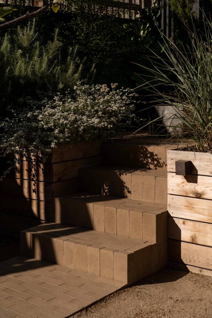 “It once was typical to pour a large concrete porch or driveway—but now, there are more options readily available and designs that use creative horizontal surfaces in an outdoor setting,” says Molly.
