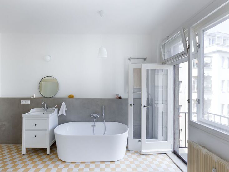Photograph courtesy of A\1 Architects, from Steal This Look: A Modernist Bath in Prague with Pale Yellow Accents from A\1 Architects.