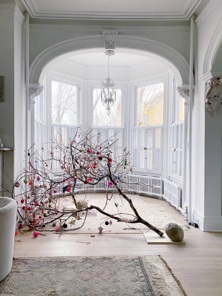 A few days after we connected with Amy about her branches, they came crashing down, likely from one of the couple&#8217;s three overzealous cats. Curiosity killed the Christmas branch. &#8220;A bunch of ornament and branch casualties. Practicing non attachment,&#8221; she wrote on Instagram.