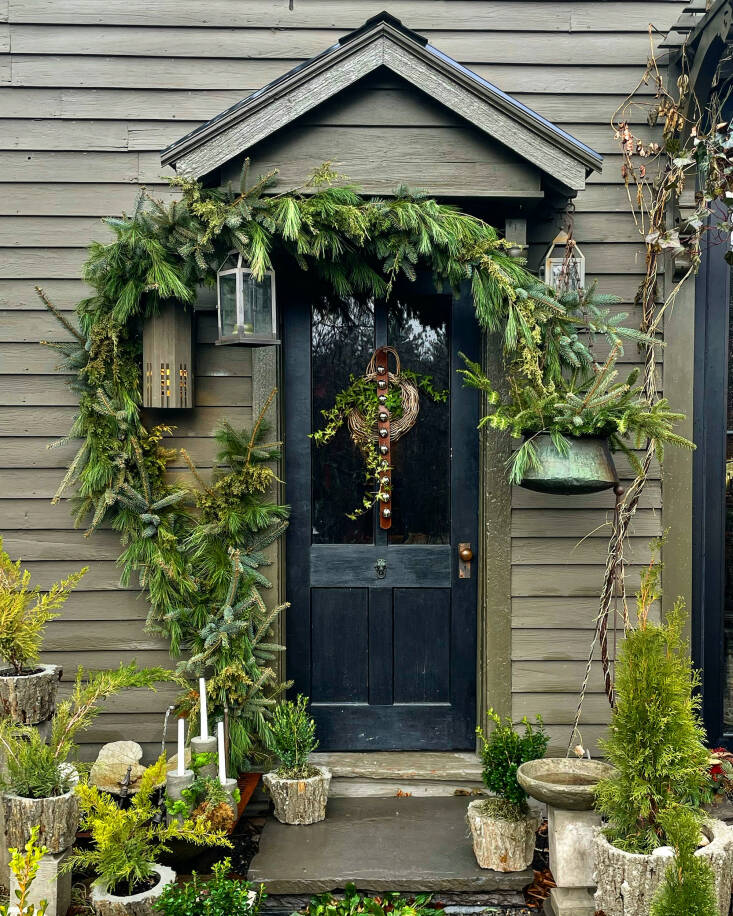 Granted, Todd Carr and Carter Harrington, of Hort & Pott in Freehold, NY, are professional makers and designers, but we think anyone can add charm to the front door with a collection of evergreens—the more, the merrier. Photograph courtesy of Hort & Pott, from Shopper