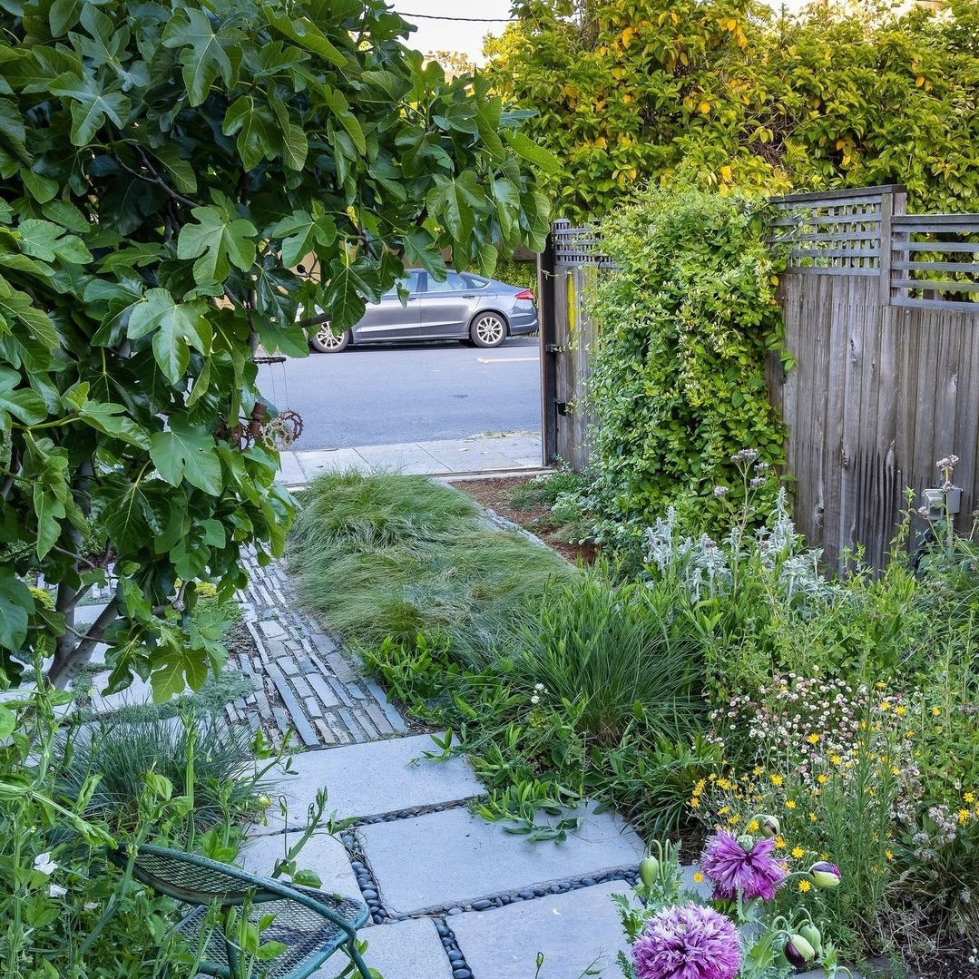 Ledgestone Tracks and Seeded Pavers, in Place of a Concrete Driveway
