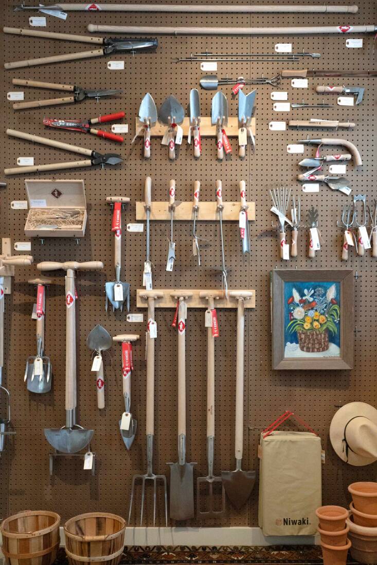 Tools neatly displayed on a pegboard wall at Gardenheir&#8\2\17;s Windham shop.