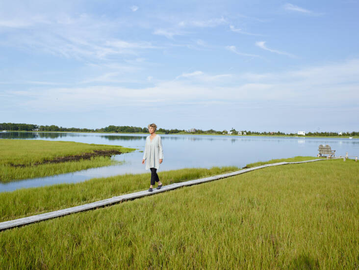 On her marsh boardwalk that leads to Accabonac Harbor and loops back to her house. Photograph by Allan Pollok-Morris.