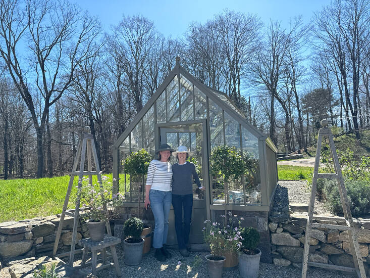 Leslie and Andrea stand in front of Needham’s greenhouse. The two do extensive research of the native flora for each project, reading extensively, walking in local parks to see what’s growing and where, and studying the conditions of the property before coming up with a plant palette.