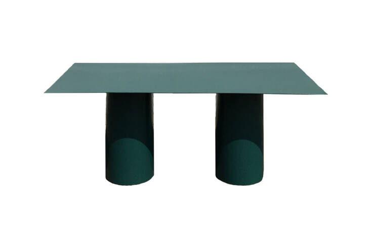 The Waka Waka Steel Cylinder Leg Table in green is made custom in powder coated steel.