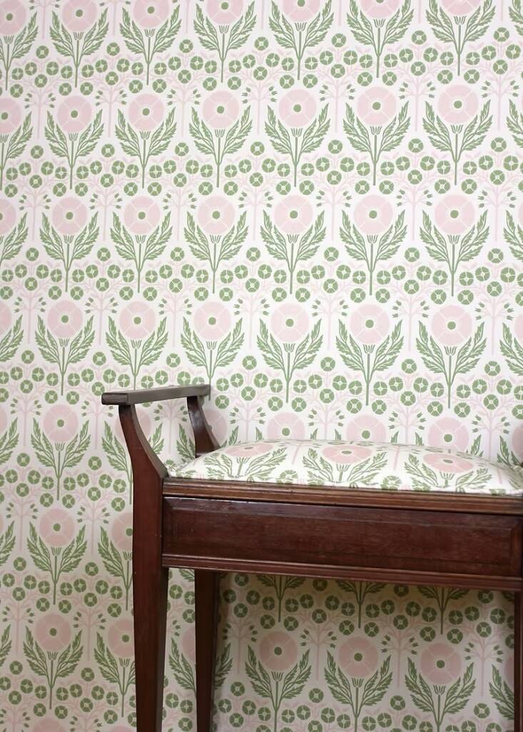 This Art and Craft-inspired pattern began as a hand-printed linocut. Shown here: Poppies Wallpaper and Poppies Fabric in Fresca.