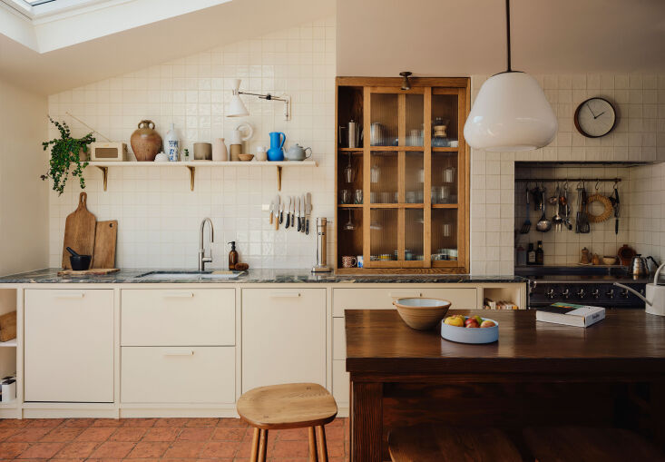 A Brooklyn cook space with midcentury accents. Photograph by Dean Hearne, courtesy of Field Day Studio, from The Forever House: A Fad-Free Home that ‘Holds Real Life Comfortably and Beautifully’.