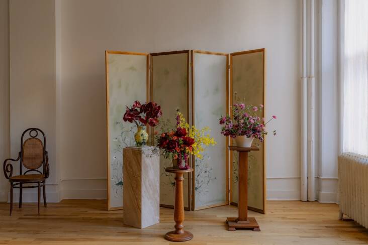 Kelsie made the screen from Home Depot wooden moldings and canvas, and enlisted Portland, Oregon-based illustrator Crystal Ochoa—who had helped with the initial sketches—to paint the panels when she was in town. The two had talked about Crystal creating a mural for the space; Kelsie came up with the idea for the screen as a flexible alternative.