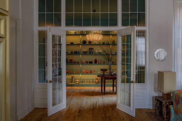 A \2\20;florist\2\17;s pantry\2\2\1; showcases Kelsie\2\17;s ever-growing collection of vases, new and old—and serves as an intriguing jewel box right off the entry. Two of Kelsie\2\17;s go-to sources for ceramics are the antiques malls and Goodwill in her hometown of Cumberland, Maryland, (her sister cases the offerings for her every Monday) and Apotheca Botanica of Mexico City (Kelsie and her husband and their four-year-old daughter spend weeks at a time in CDMX and always return with new pieces).