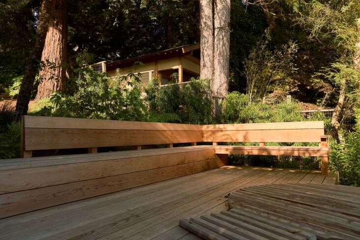 Redwood decking and a large open bench.
