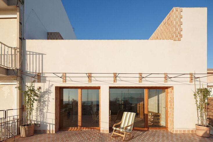 Photograph by Luis Díaz Díaz, from The Case for Exposed Building Blocks: An Inspired Vacation Enclave in Mallorca. (For vintage-inspired, patinated outdoor pots, try Rejuvenation\2\17;s Antique Terracotta Planters.)