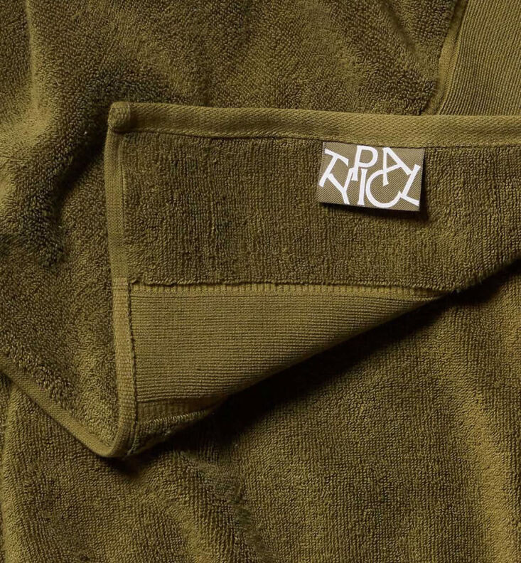  Above: \2\20;Historically, I\2\17;ve been a staunch supporter of all-cotton terry towels, but this summer, I\2\17;ve found myself wrangling our oversized ones at the beach and at the pool with enough frustration that it led me to rethink our set up. I went with a more \2\16;athletic towel\2\17; from new brand Typical—it\2\17;s a stretch towel that holds its shape, stretches well around a tired child, and stays reliably soft. I liked the Ceramic Clay color, but they have more colorful options on offer too.\2\2\1; \2\1\1; Alexa Hotz; photograph from Typical