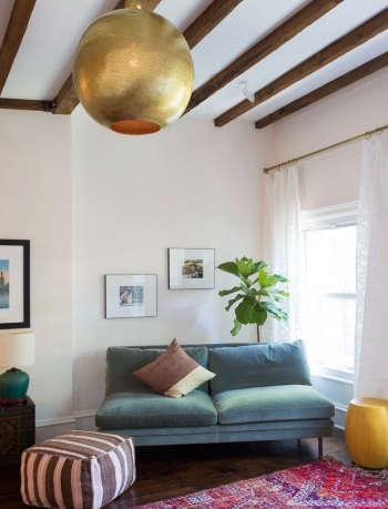 Indigo & Ochre Design Clinton Hill Brooklyn brownstone master bedroom seating area with vintage Moroccan carpet & L'aviva brass Egyptian lantern