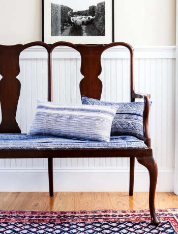Indigo & Ochre Design Waltham Massachusetts entry foyer with antique bench upholstered in vintage hmong indigo hemp