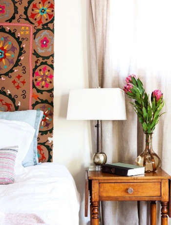 Indigo & Ochre Design Waltham Massachusetts master bedroom with vintage suzani headboard
